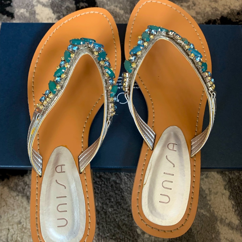 Pretty gem flip flops size 7M. Rarely worn.